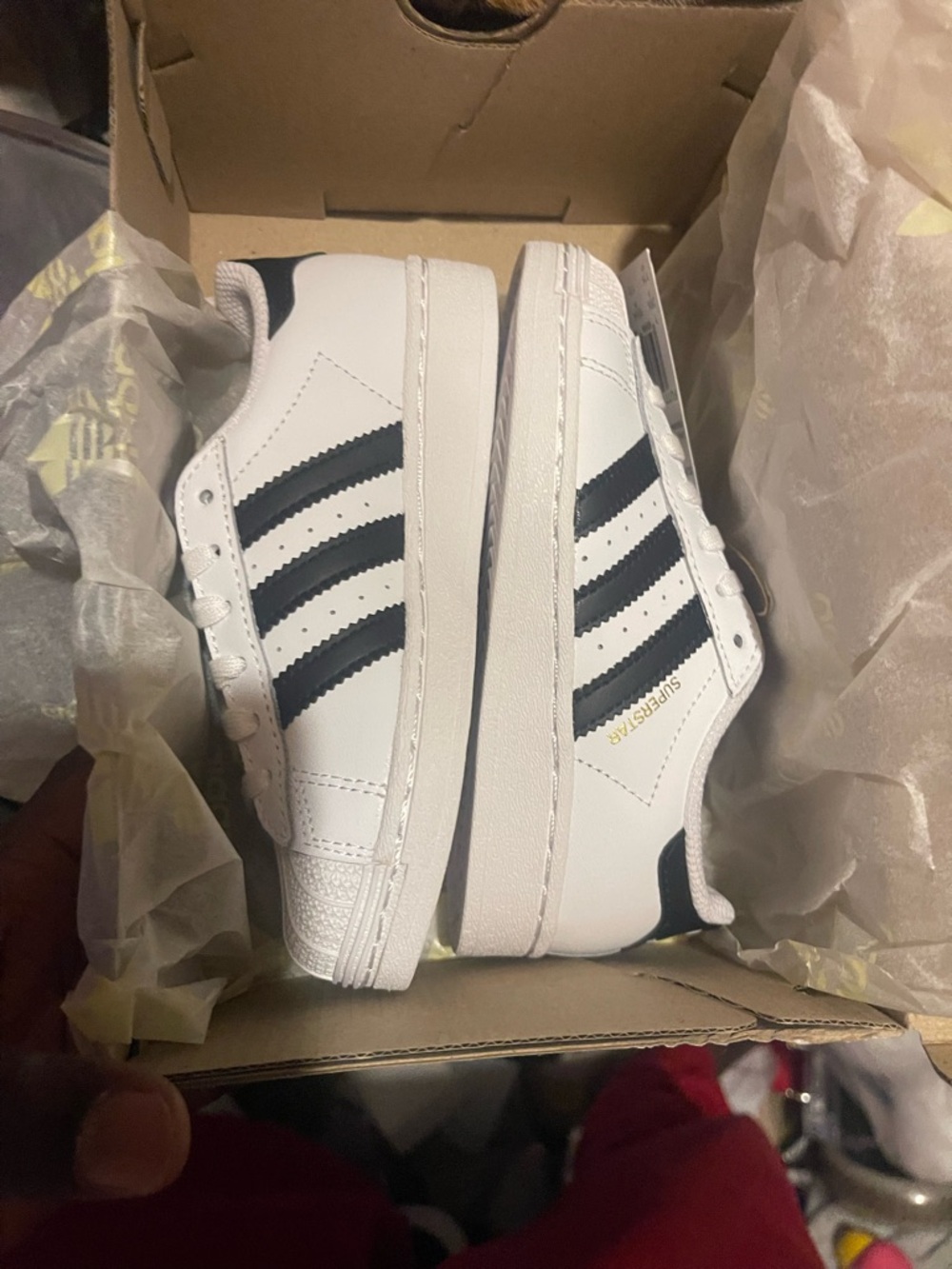 adidas White Sneakers with Black Stripes and Gold Accent